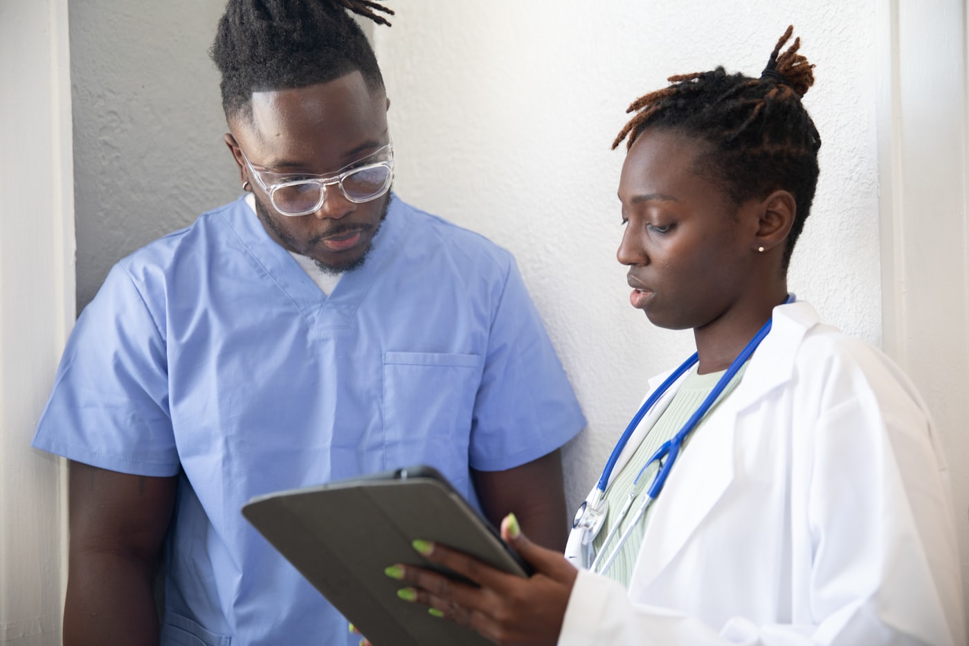 African doctor consulting with a patient