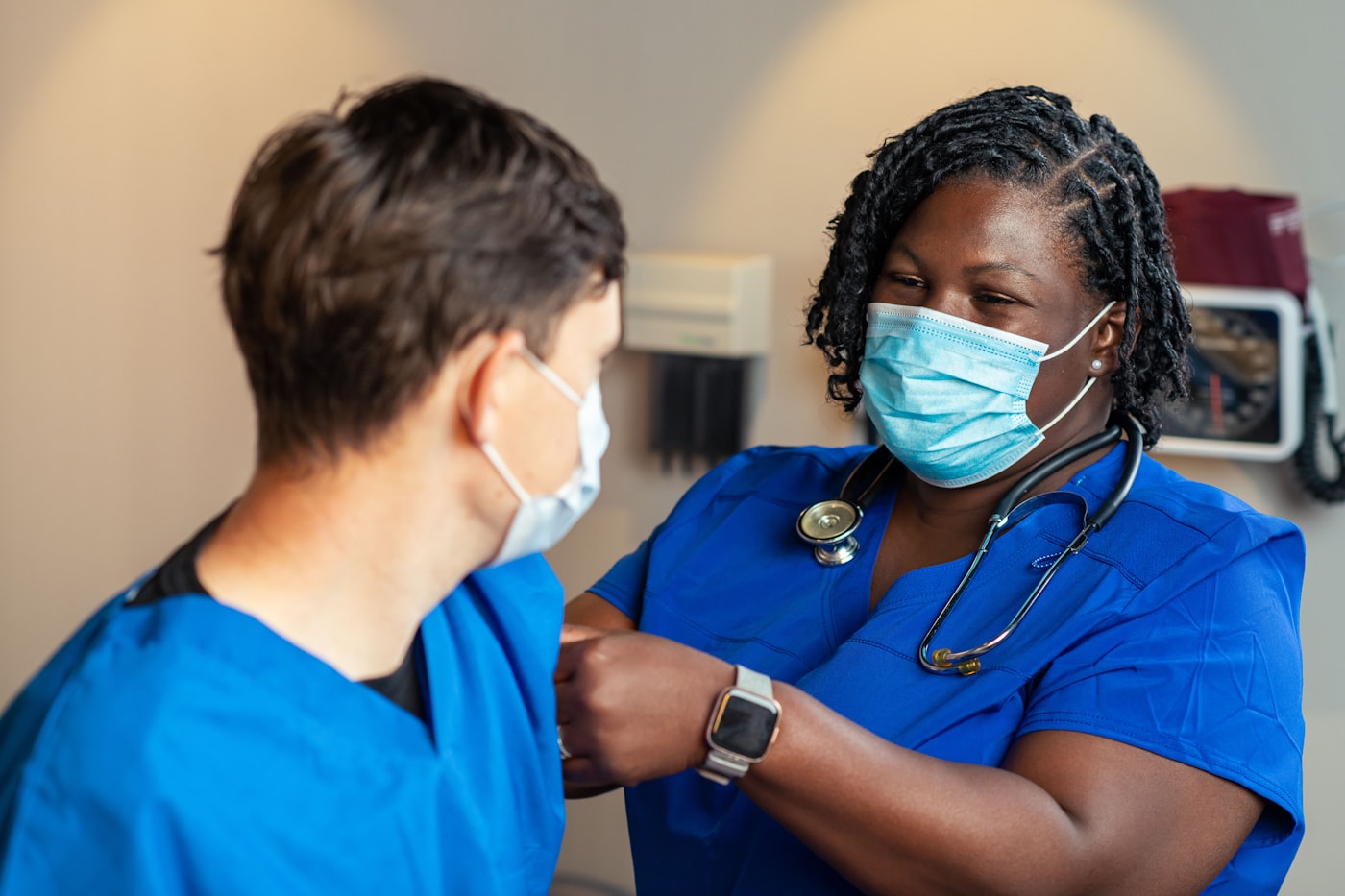 Nurse caring for an admitted patient on a hospital ward